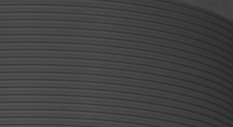 A close-up dark grey abstract pattern